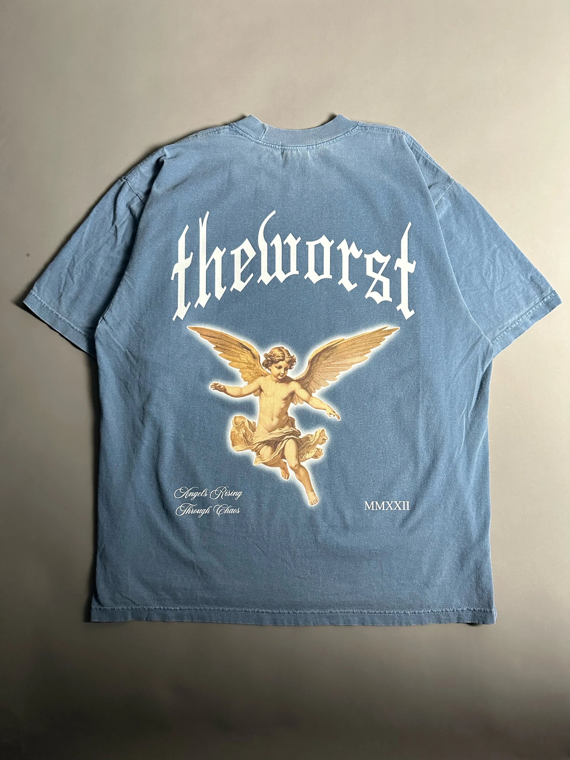 RISING THROUGH CHAOS OVERSIZED TEE IN WASHED BLUE