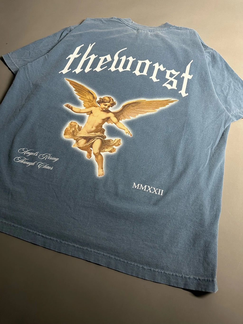 RISING THROUGH CHAOS OVERSIZED TEE IN WASHED BLUE