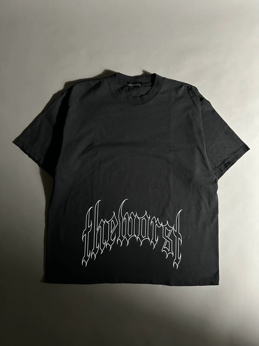 RISE THROUGH CHAOS “OVERSIZED” TEE IN BLACK