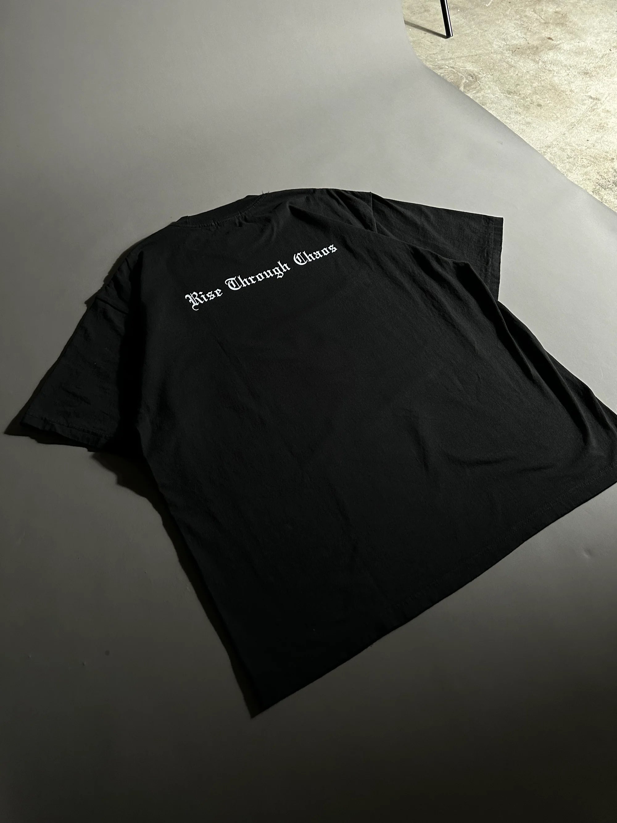 RISE THROUGH CHAOS “OVERSIZED” TEE IN BLACK