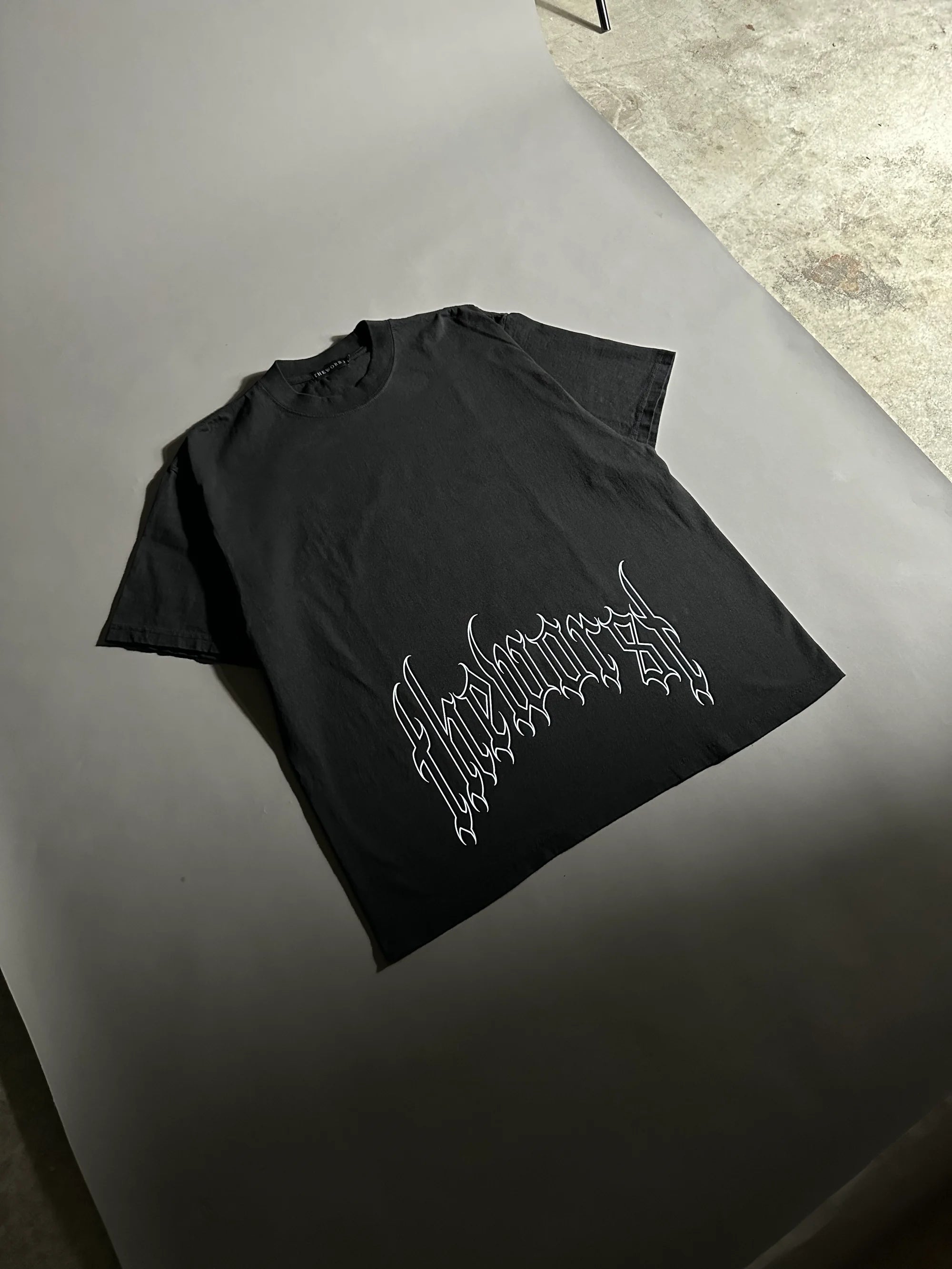 RISE THROUGH CHAOS “OVERSIZED” TEE IN BLACK